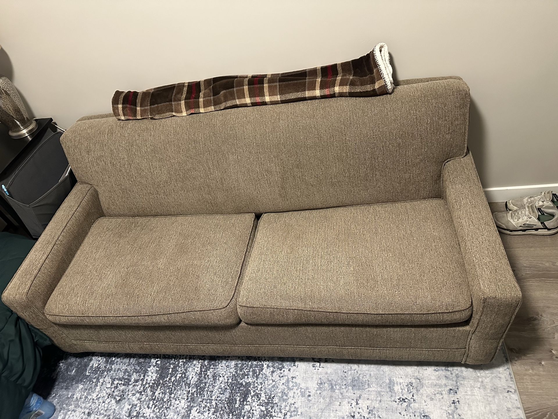 Sofa bed with a full size mattress