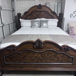 Cal-King Bed. Solid wood Bedframe, In Good Condition. Includes Two Box Springs And A Very Plush And Comfortable Pillow Top  Mattress. Hablo Español