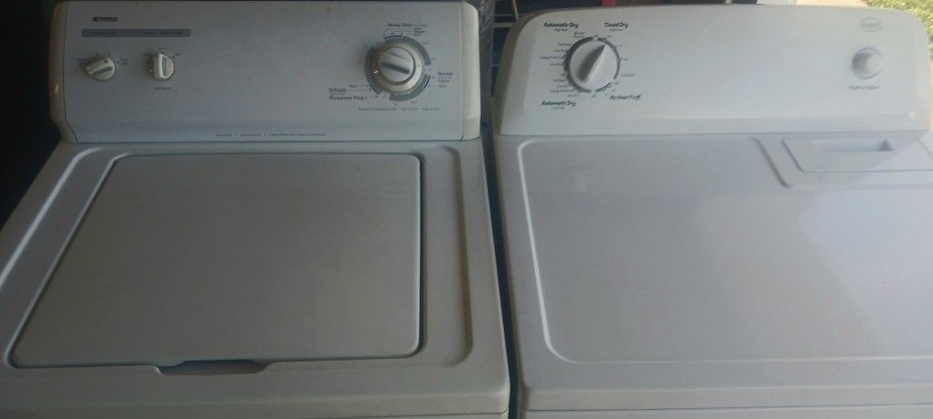 White Kenmore/ Amana Washer and Electric Dryer Set.