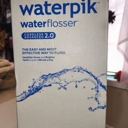 New in box Waterpik Cordless Flosser