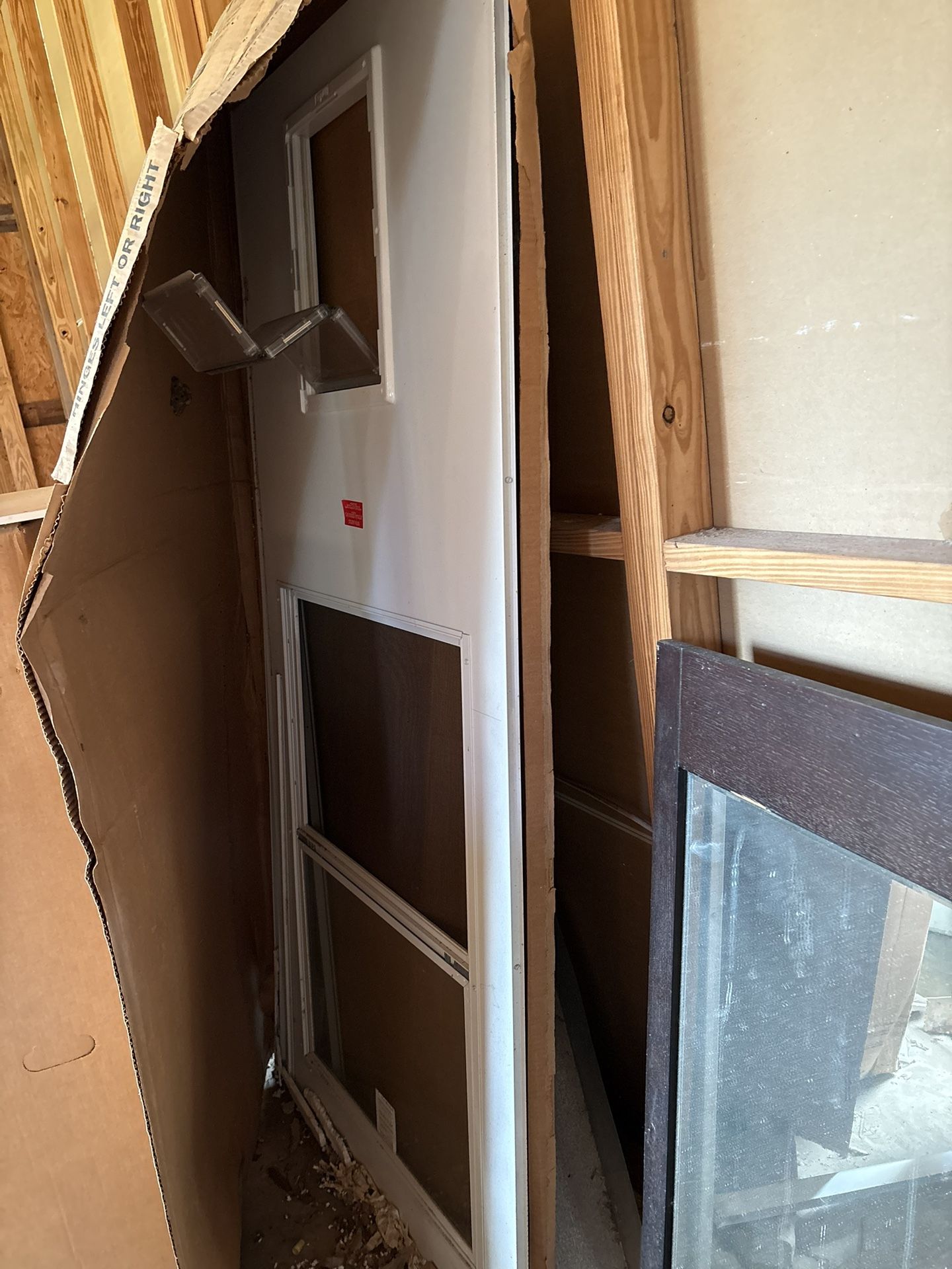 Pet Entry Vinyl Storm Door 36in X 80 In Pet door opening is 10-1/2 in. x 15