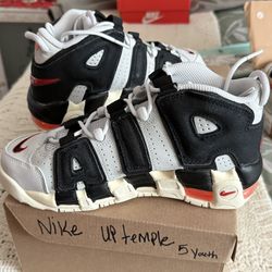 Nike up-tempo, and a pair of DC