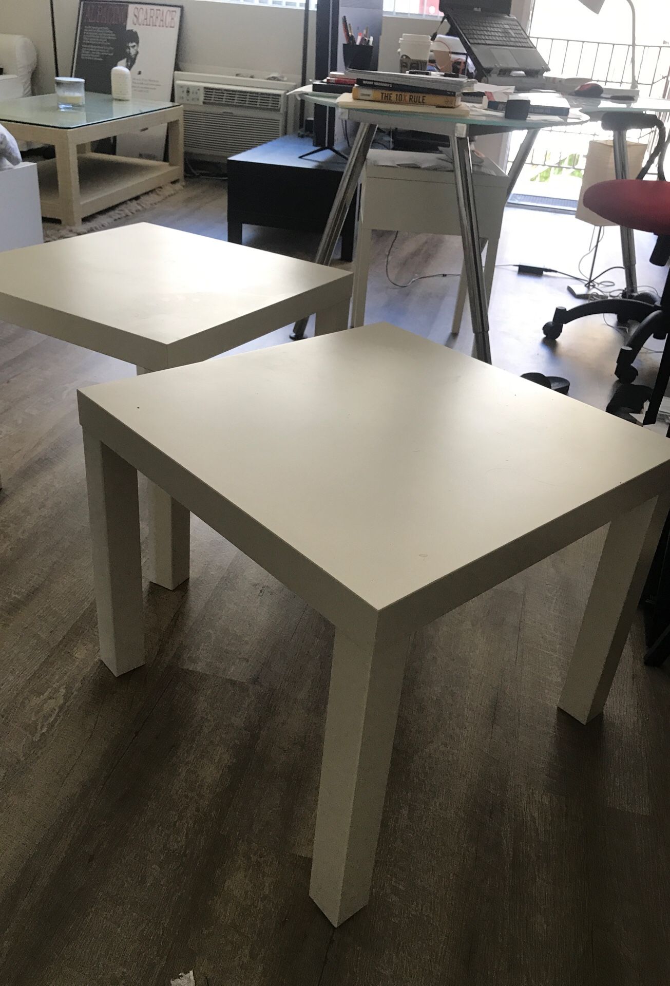 Two white ikea coffee tables