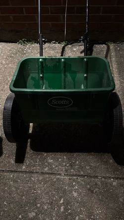 One drop fertilizer, spreader, Scott’s, and one scarf, easy spread for grass seed both together