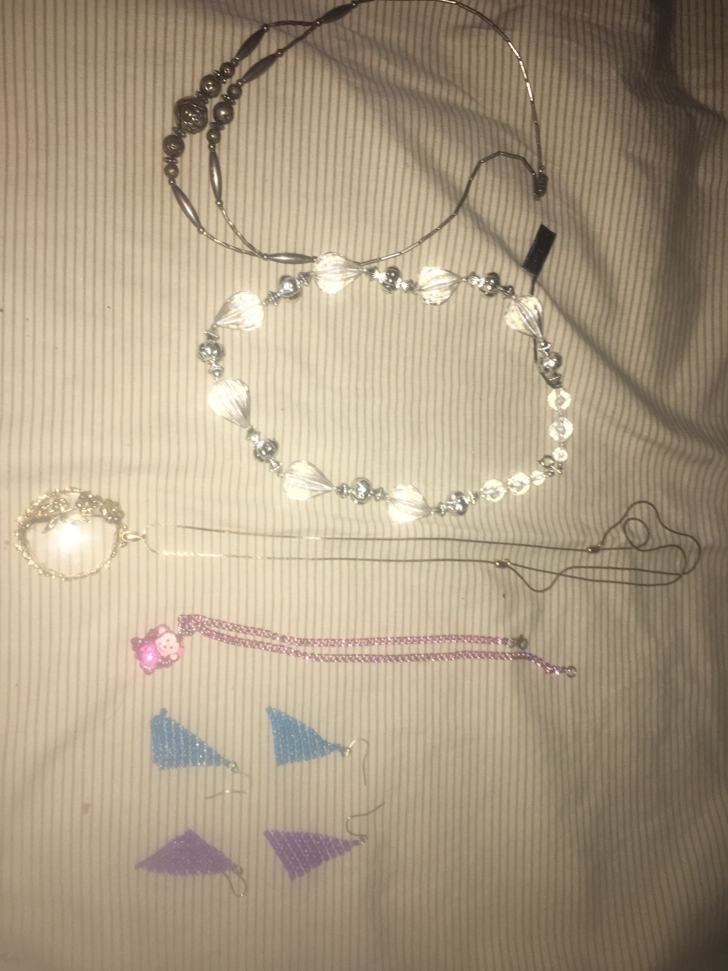 Clip on earrings necklaces and pins
