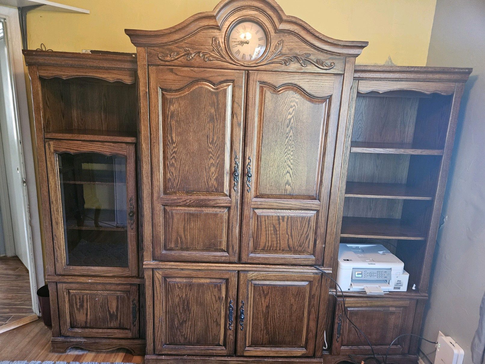 Entertainment Center with built in clock  and two book shelves 