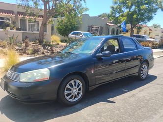 2003 Saturn new registration new tires cold AC runs good great on gas