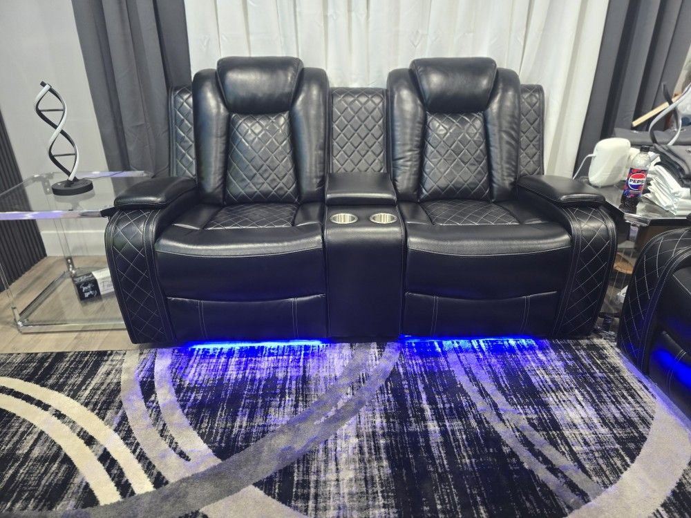 Brand New Faux Leather Power Reclining Love Seat