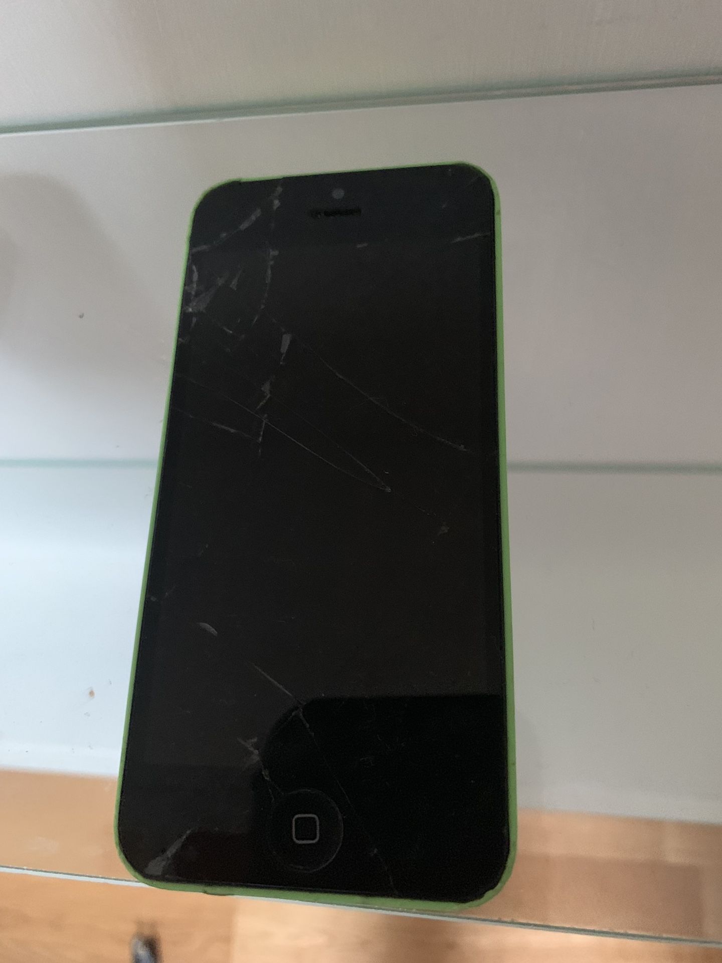 IPhone 5c, green, cracked screen, good battery