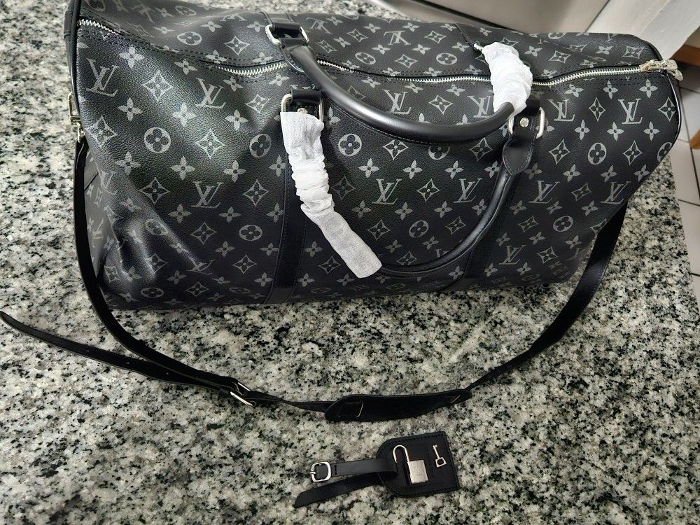 Louis Vuitton
Monogram Duffle Bag