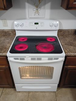 GE, White Electric Stove.