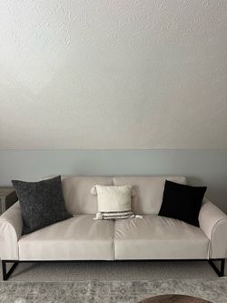 Ivory colored velvet futon
