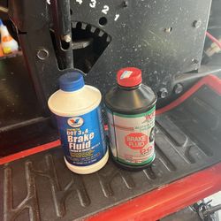 Two Bottles Of Brake Fluid 