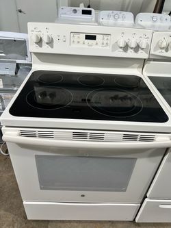 Estufa GE en color beige como nueva