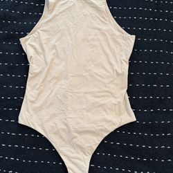 SKIMS  Bodysuit in Nude
