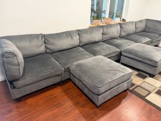 Large grey sectional couch