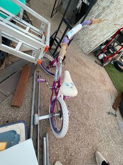 Pink mini bike and jeep both together