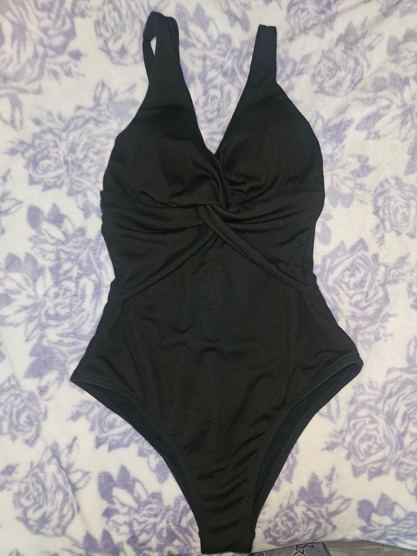 black Old Navy twist-front one-piece swimsuit featuring a V-neckline and textured material.