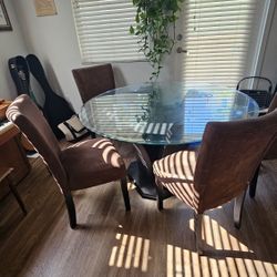 Dining room table with 4 chairs. $20Obo