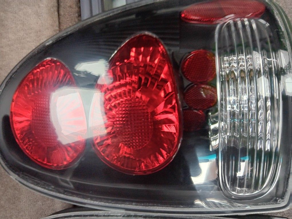 Tail Lights For A 1997 Plymouth Voyager Minivan