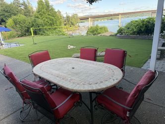 Luxury Designer Stone Patio Dining Set from a Waterfront Home