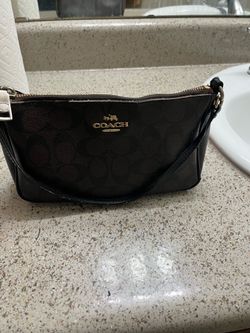 Brown shoulder coach bag