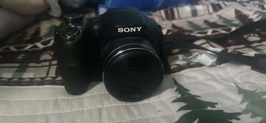 Sony Camera/ Gucci Wallet