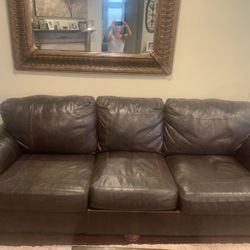 Ashleys Furniture 4 piece brown leather couch set  