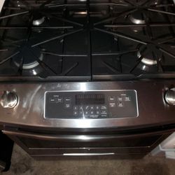 slide in use stove GE stainless  great condition 90 days warranty