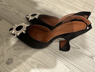 Amina muaddi black heels
