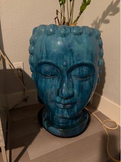 Buddha head flower pot