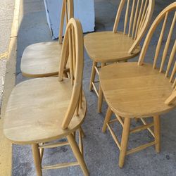 4 solid Swivel wood chairs
