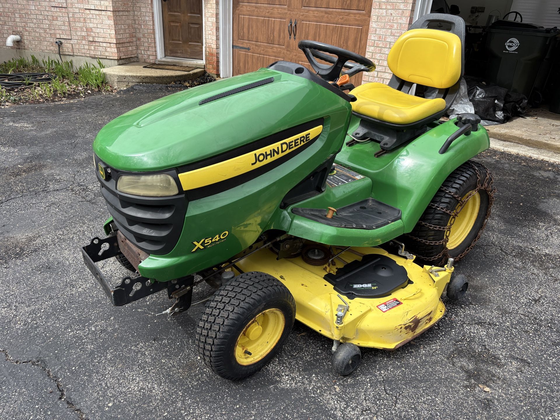 John Deere x540 tractor with mower deck and snowplow