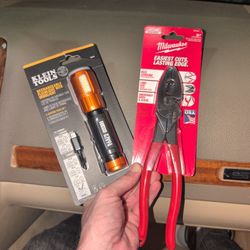 Milwaukee Lineman's Pliers And A Klein Tools Flashlight