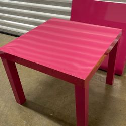 pink kids table 1 and 1/2 feet tall