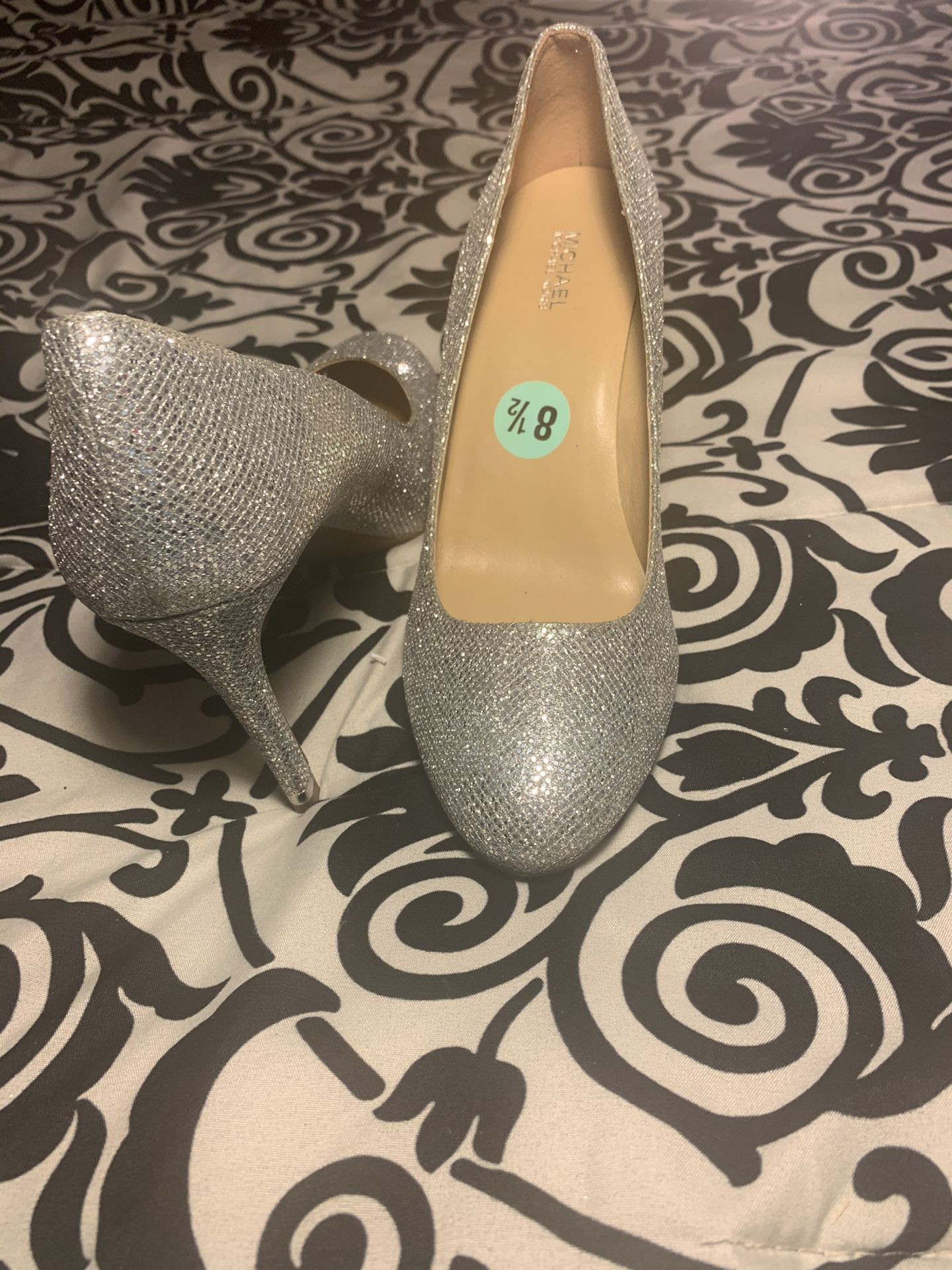 Michael Kors Women’s high heels Size 8.5 Color Silver Pre Own Condition