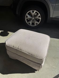 Light Pink Swivel Ottoman 
