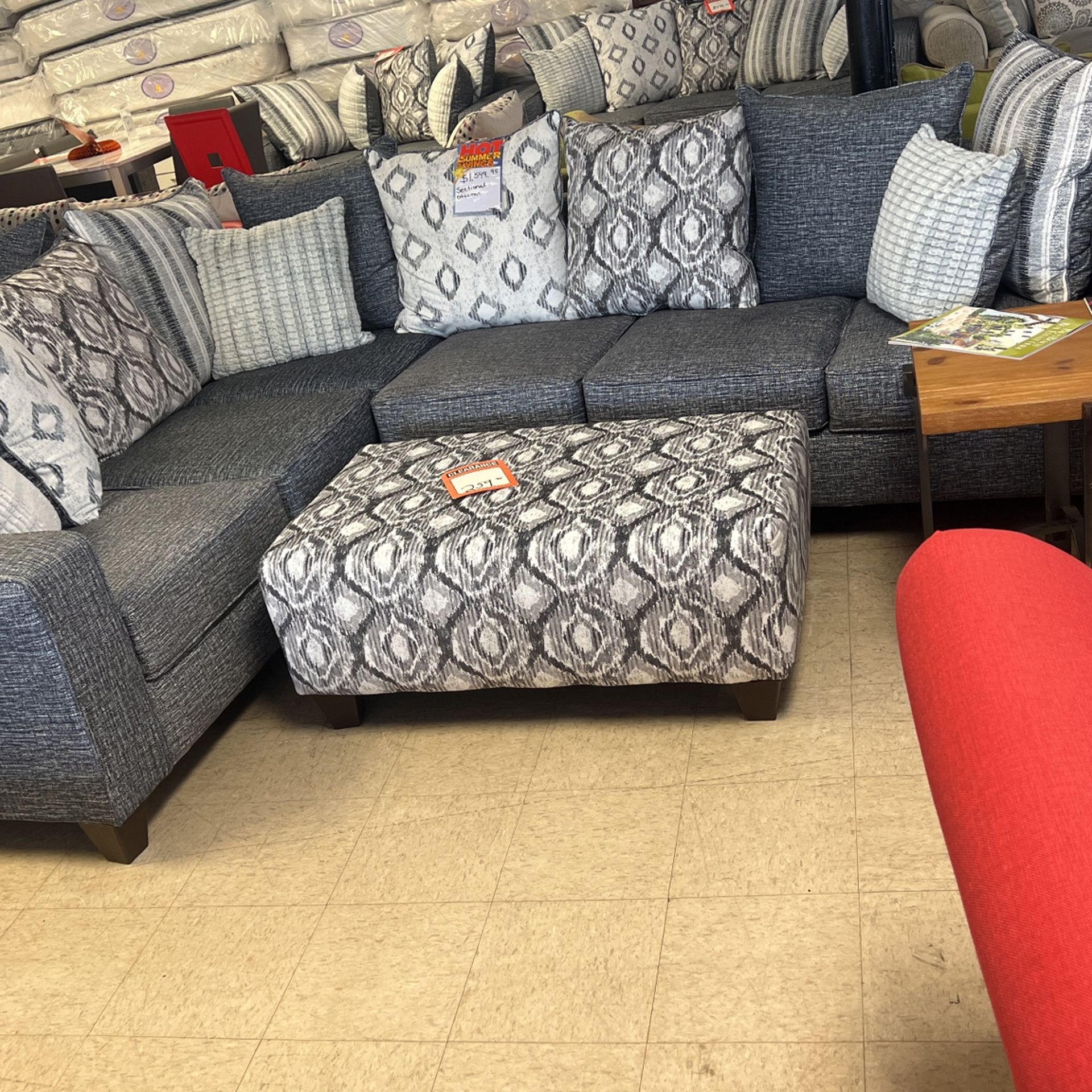 Brand new sectional with cocktail ottoman 1549