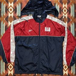 Vintage “Y2K” Reebok New England Revolution Hooded Winbreaker Jacket Men’s Large