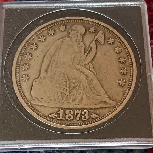 1873 SEATED LIBERTY DOLLAR W/ARROW ON BOTH SIDES OF DATE, VERY RARE