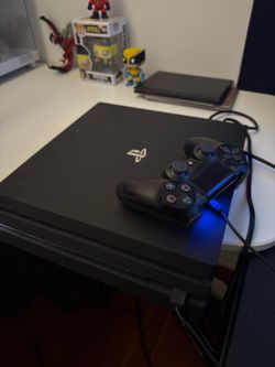 PlayStation 4 Pro with Controller + Marvel’s Spider Man