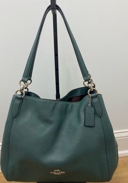 Coach Hallie Pebble Leather Shoulder Bag. Dimensions 4x10x14. Brand new without tag and dust bag 