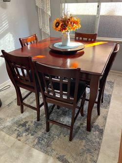 Pub style table with 5 chairs
