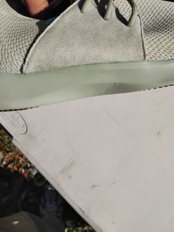 Olive green running shoes