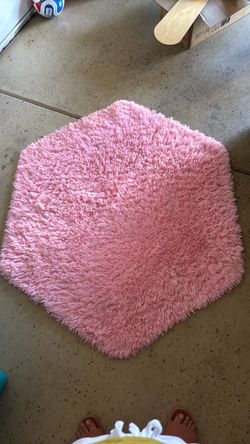 Pink area rug