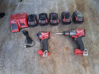 Milwaukee drills and 5 18v 5amp batteries