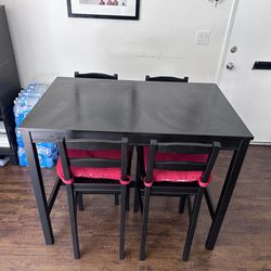 1 Bar table dining with 4 chairs Good condition $80