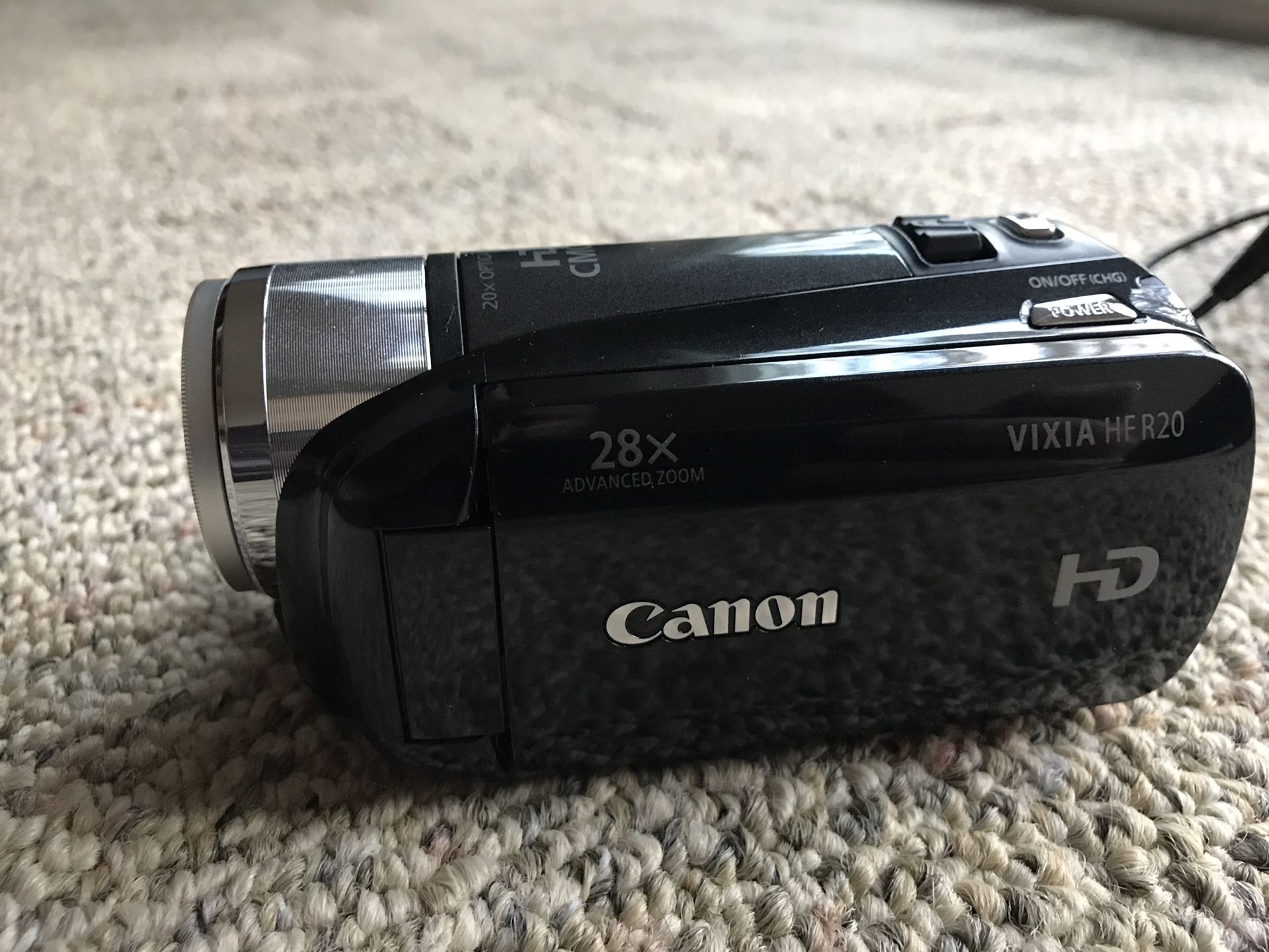 Like new Canon Vixia HF R20, includes telephoto and wide-angle lenses, camera bag, charging cord and 32GB storage card.