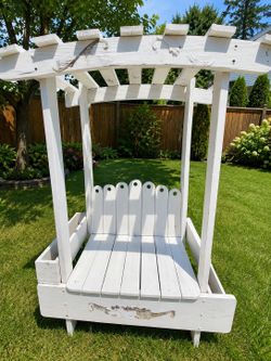 White wood garden bench pergola