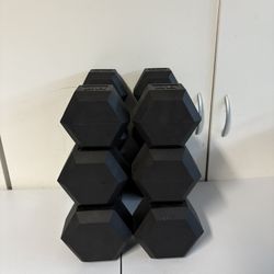 Brand new Pairs of 20 25 and 30 lbs dumbbells